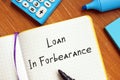 Financial concept meaning Loan In Forbearance with phrase on the page Royalty Free Stock Photo