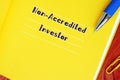 Financial concept meaning Non-Accredited Investor with phrase on the piece of paper
