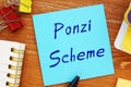 Financial concept meaning Ponzi Scheme with inscription on the sheet