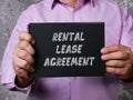 Financial concept meaning RENTAL LEASE AGREEMENT with inscription on the page Royalty Free Stock Photo