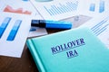 Financial concept meaning ROLLOVER IRA Individual Retirement Accounts with phrase on the notepad Royalty Free Stock Photo