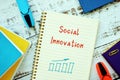 Financial concept meaning Social Innovation with sign on the page