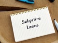 Financial concept meaning Subprime Loans with sign on the page