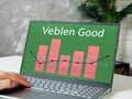 Financial concept meaning Veblen Good with phrase on the piece of paper Royalty Free Stock Photo