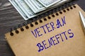 Financial concept meaning VETERAN BENEFITS with inscription on the page