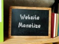 Financial concept meaning Website Monetize with inscription on the piece of paper