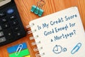 Financial concept about Is My Credit Score Good Enough for a Mortgage? with sign on the sheet