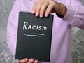 Financial concept about Racism with sign on the page Royalty Free Stock Photo