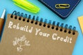 Financial concept about Rebuild Your Credit with sign on the piece of paper Royalty Free Stock Photo