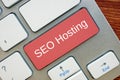 Financial concept about SEO Hosting with inscription on the page