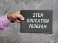 Financial concept about STEM EDUCATION PROGRAM with inscription on the piece of paper