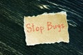 Financial concept about Stop Bugs with sign on the sheet