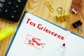 Financial concept about Tax Grievance with sign on the sheet