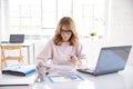 Financial consultan businesswoman working on laptop in the office