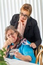 Financial Consultant Handing Scissors to Senior Lady Holding Credit Cards