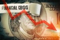 Financial Crisis word under the torn dollar bill. Economist forecast for the United States. Glowing red arrow going downwards on