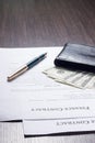 Financial document with wallet and fountain pen Royalty Free Stock Photo