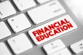 Financial Education - ability to manage personal finance effectively, text concept button on keyboard