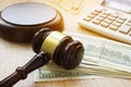 Financial fraud. White collar crime. Gavel, calculator and money. Royalty Free Stock Photo