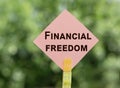 Financial freedom text concept on note paper Royalty Free Stock Photo