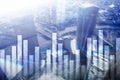 Financial graphs and charts on blurred business center background. Invesment and trading concept Royalty Free Stock Photo