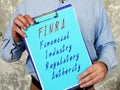 Financial Industry Regulatory Authority FINRA sign on the sheet