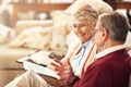 Financial, insurance and budget with an old couple in their home for retirement or pension planning. Accounting, money Royalty Free Stock Photo