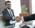 Financial partners handshake after signing contract Royalty Free Stock Photo