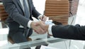 Financial partners handshake after signing contract Royalty Free Stock Photo