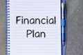 Financial plan text concept on notebook Royalty Free Stock Photo