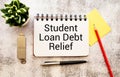 Financial problem concept. Loan Debt Concept. Selective focus on the board hand written loan debt Royalty Free Stock Photo