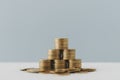 Financial pyramid, business growth, saving money, RMF, LTF, fund concept. Stacking in pyramid shape on blue background,