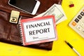 Financial report-text label in the planning Notepad on the document portfolio. Royalty Free Stock Photo