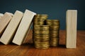 Financial stability and savings. Wooden blocks and stack of coins