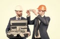 financial support. investment in architectural project. two men businessman in hardhat with money.