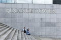 Financial tower. People are sitting on the steps. Brussels, Belgium, 10-12-2019 Royalty Free Stock Photo
