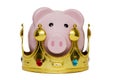 Financial winner or king of money savings concept, pink piggy bank wearing a golden crown on white background, best future investm Royalty Free Stock Photo