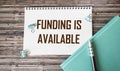 Financing Available, Text on Notepad and Wooden Table Sponsored Financing Business Royalty Free Stock Photo