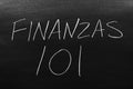 Finanzas 101 On A Blackboard Royalty Free Stock Photo