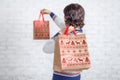 Find idea for gift, shopping bag in female hand Royalty Free Stock Photo