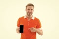 Find latest mobile news. Happy man point finger at mobile phone. Mobile device. Modern life. New technology. Cool gadget
