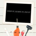 Find it, learn it, do it against tools and tablet on wooden background