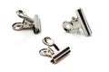 Metal bulldog clip isolate on white Royalty Free Stock Photo