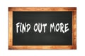 FIND  OUT  MORE text written on wooden frame school blackboard Royalty Free Stock Photo