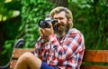 Find perfect angle. Man with retro camera. Photography in modern life. Photographer use vintage camera. Bearded man
