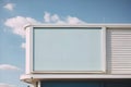 Blank shop sign against clear blue sky