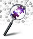 Find solution concept with magnifying glass and puzzle