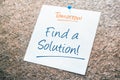 Find a Solution Reminder For Tomorrow On Paper Pinned On Cork Board