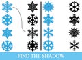 Find the true shadows silhouettes of snowflakes. Education Royalty Free Stock Photo