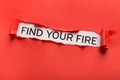 Find your fire inscription showing up behind red torn paper